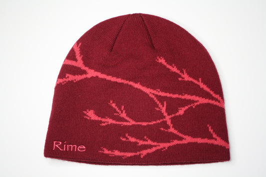 Burgundy beanie fallen branch